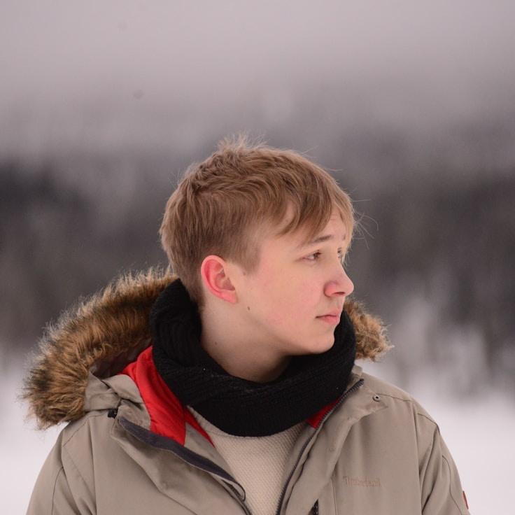 Ariya Khan, Lead Design Curator at Balanced Thinking Space, reviewing corporate floral arrangements